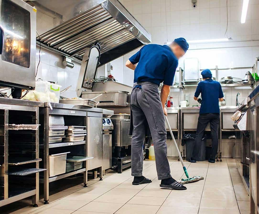 cleaning restaurant kitchen wall